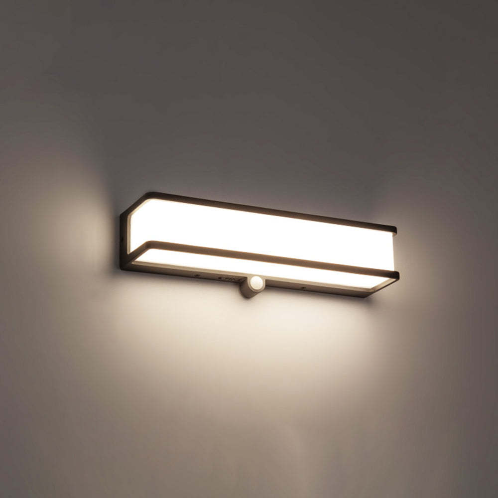 Orr solar wall lamp: minimalist outdoor light with sensor.