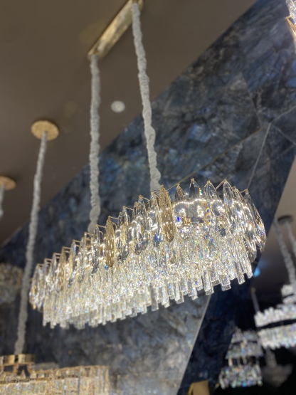 Light luxury crystal restaurant chandelier 2025 new high-end designer dining table dining room bar main lamp