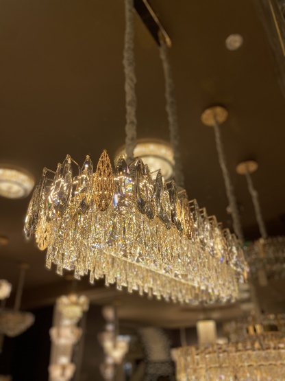 Light luxury crystal restaurant chandelier 2025 new high-end designer dining table dining room bar main lamp