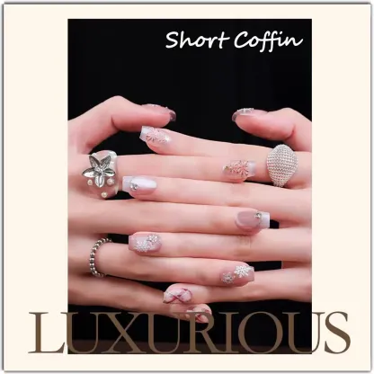 Barbie's Snow Globe Press-On Nails | Medium Almond & Short Coffin | Icy Pink Winter Wonderland 