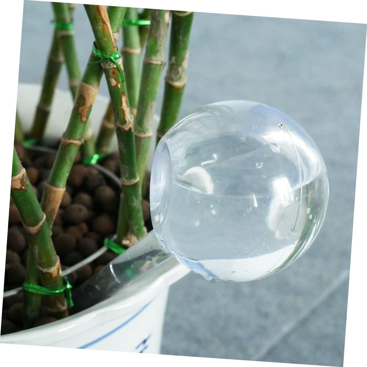 Plastic travel waterer for flowers and houseplants