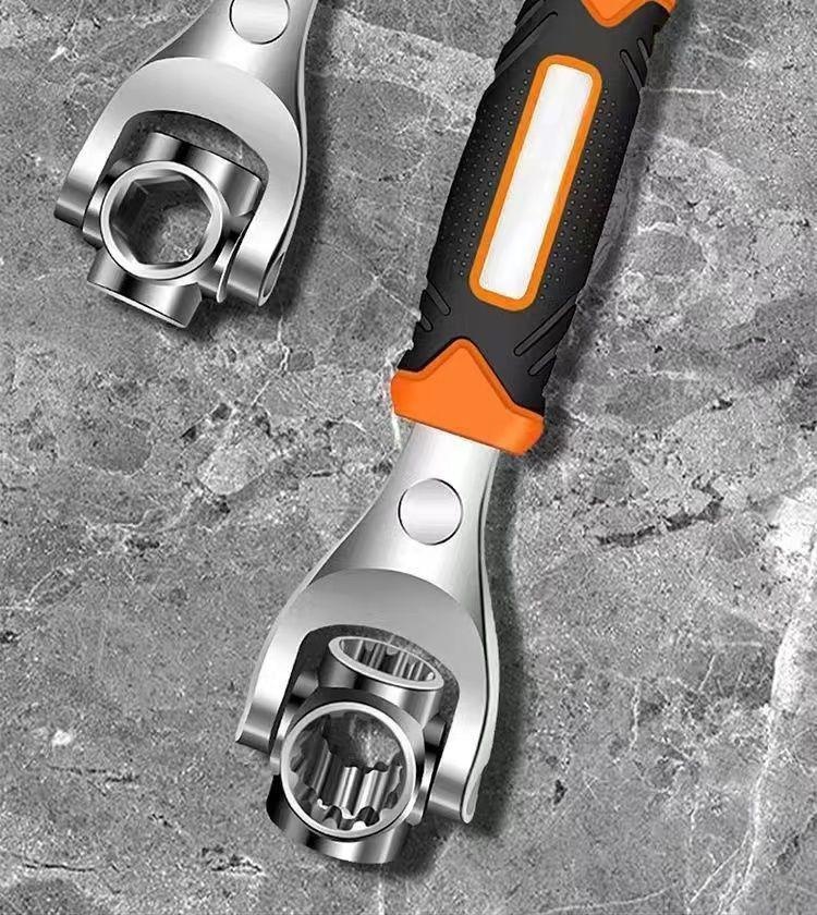 Close-up of rotating wrench head with multiple sockets