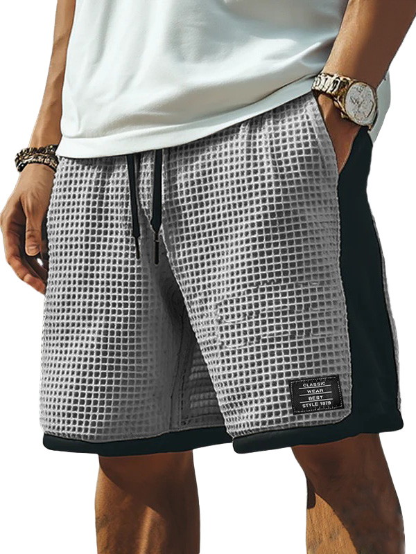 Men's Fashion Retro Patchwork Contrast Color Embroidered Logo Loose Elastic Drawstring Pocket Shorts