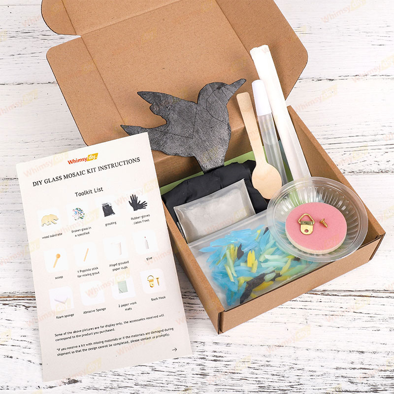 Everything you need to make a hummingbird glass mosaic. Wooden base, broken glass, grout, etc.