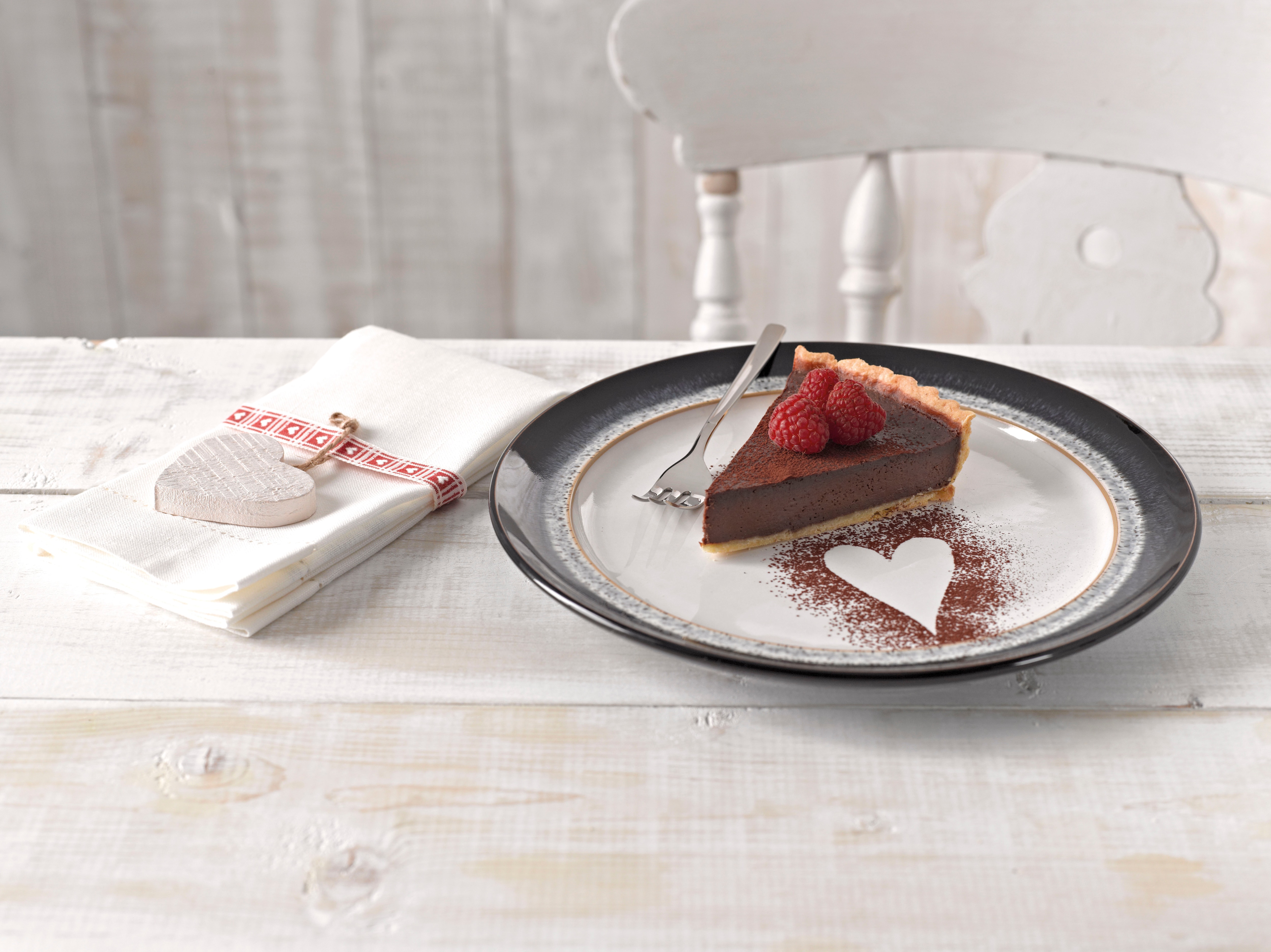 Romantic dessert of chocolate tart with fruit