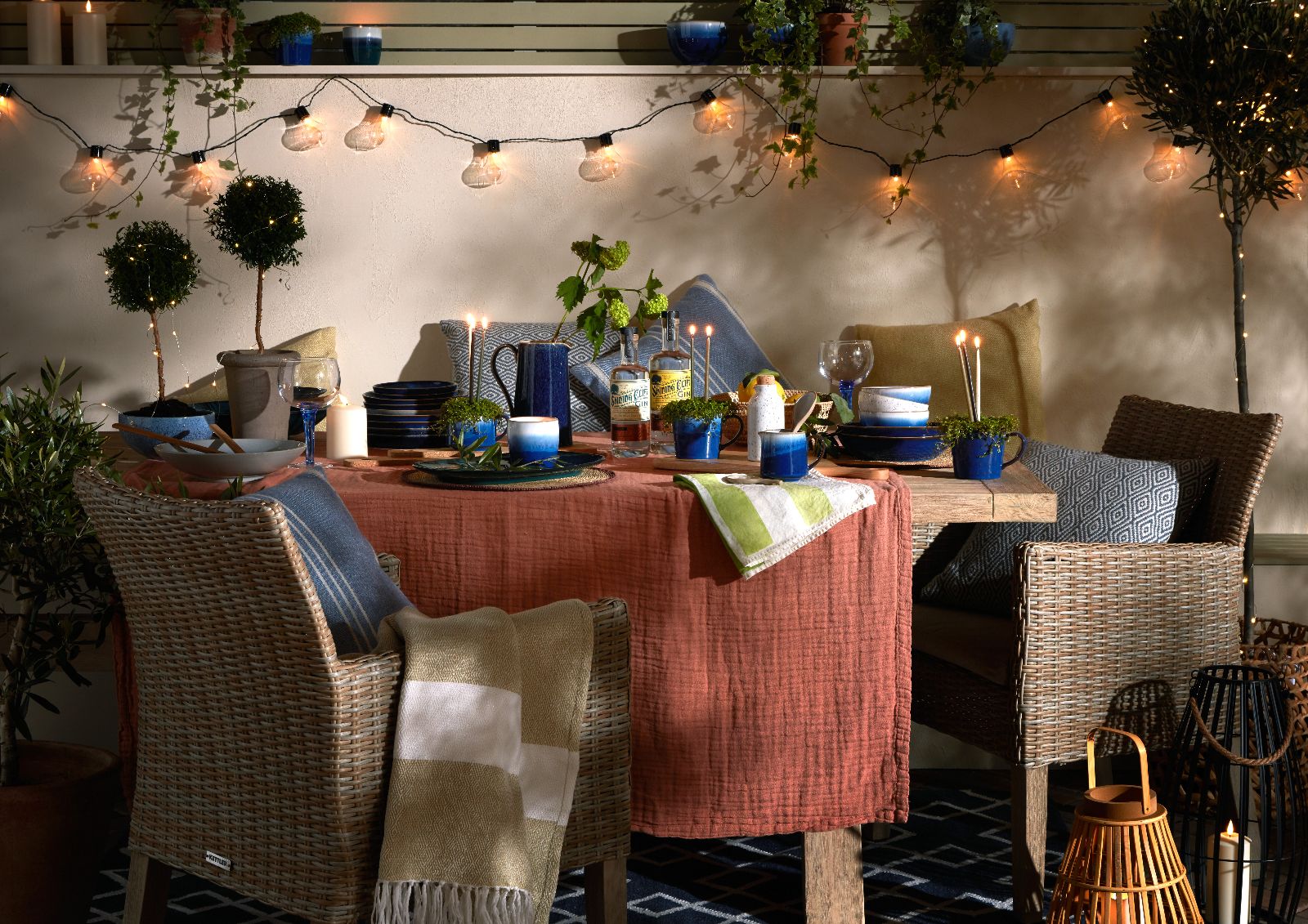 Outdoor dining table with string lights
