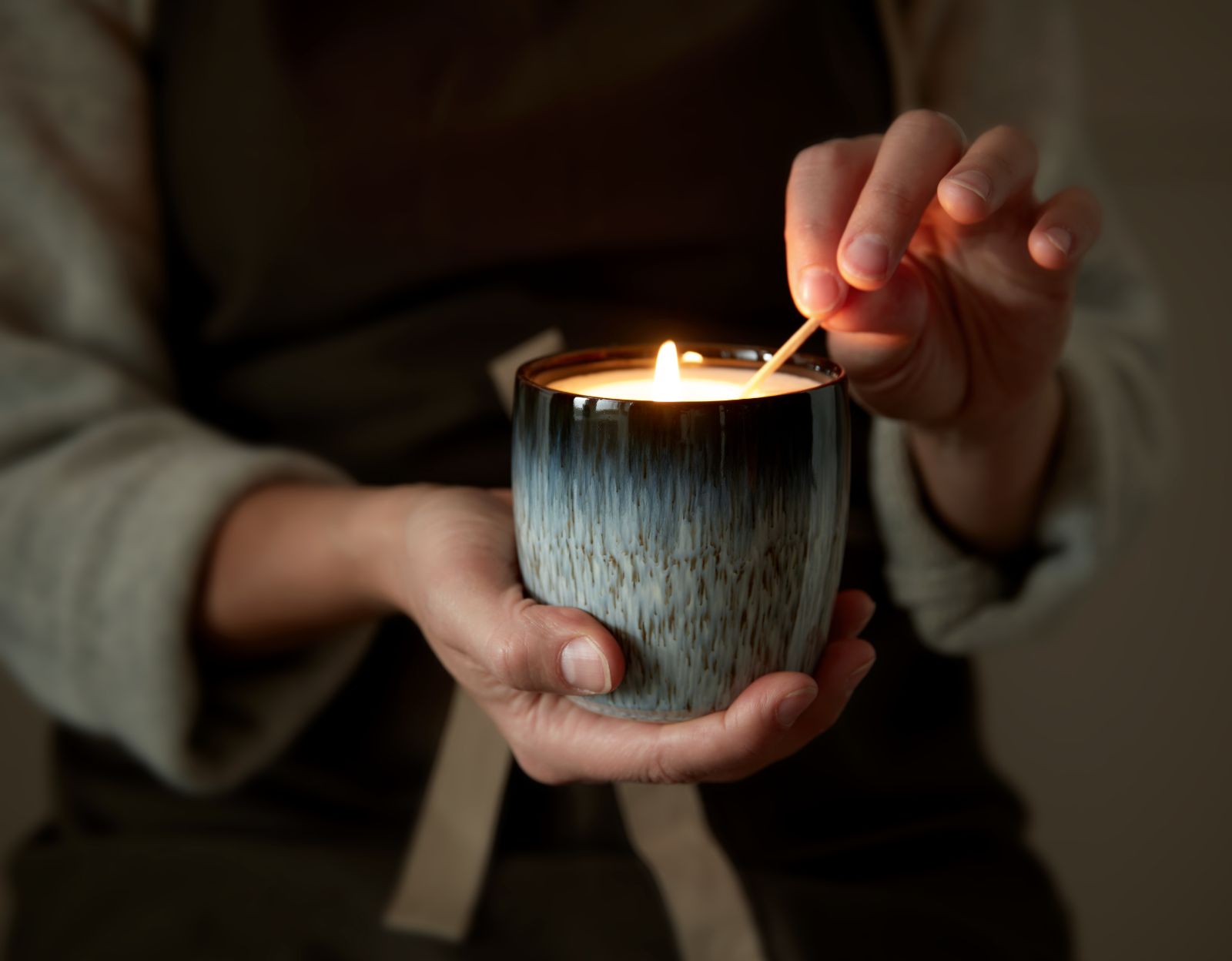 Candle being lit with a match