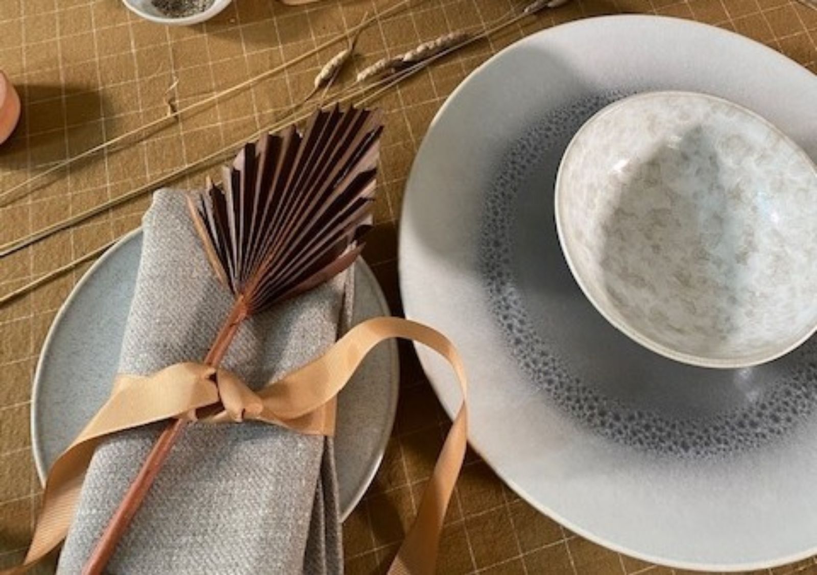 Fall place setting and folded napkin