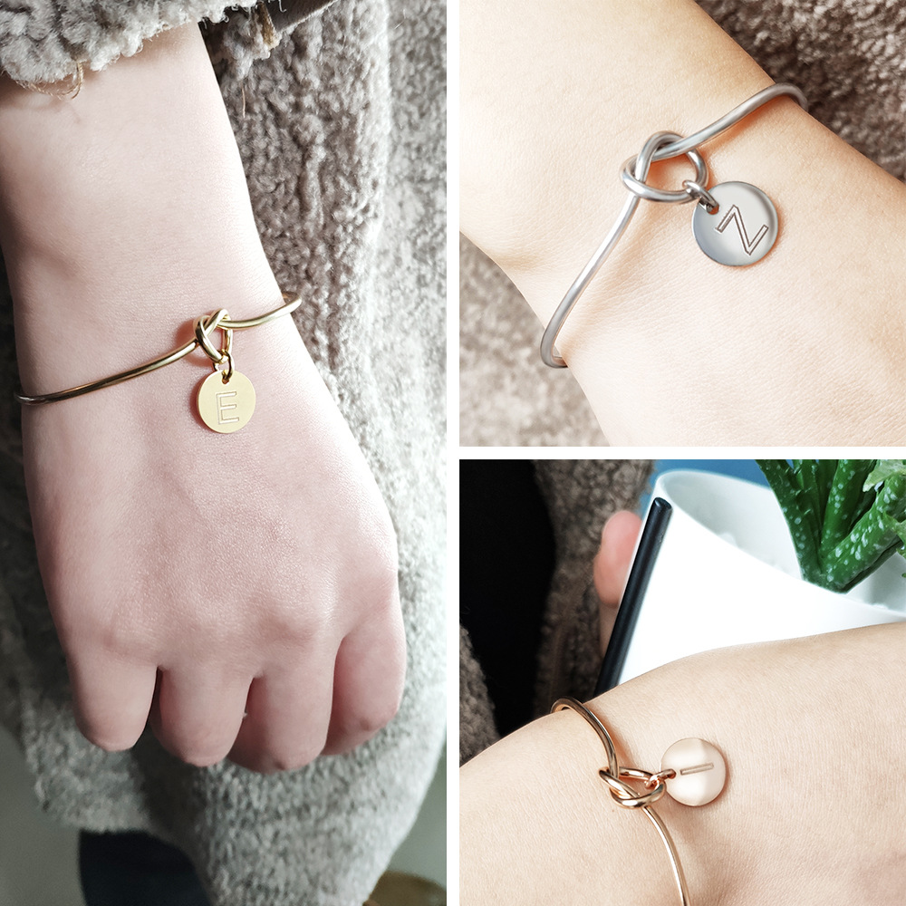 Alphabet charm tie bracelet 