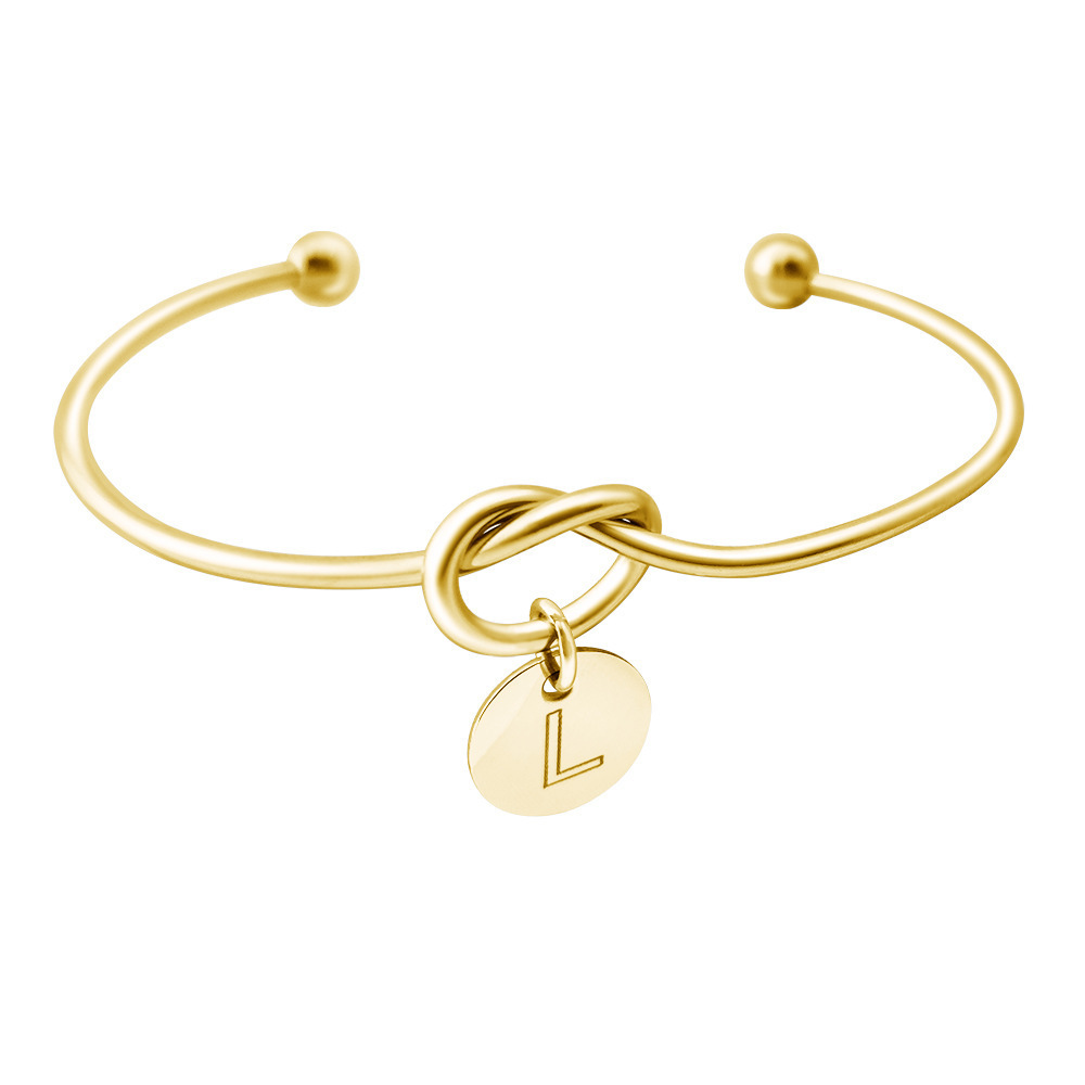 Alphabet charm tie bracelet