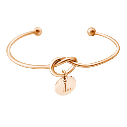 Alphabet charm tie bracelet 