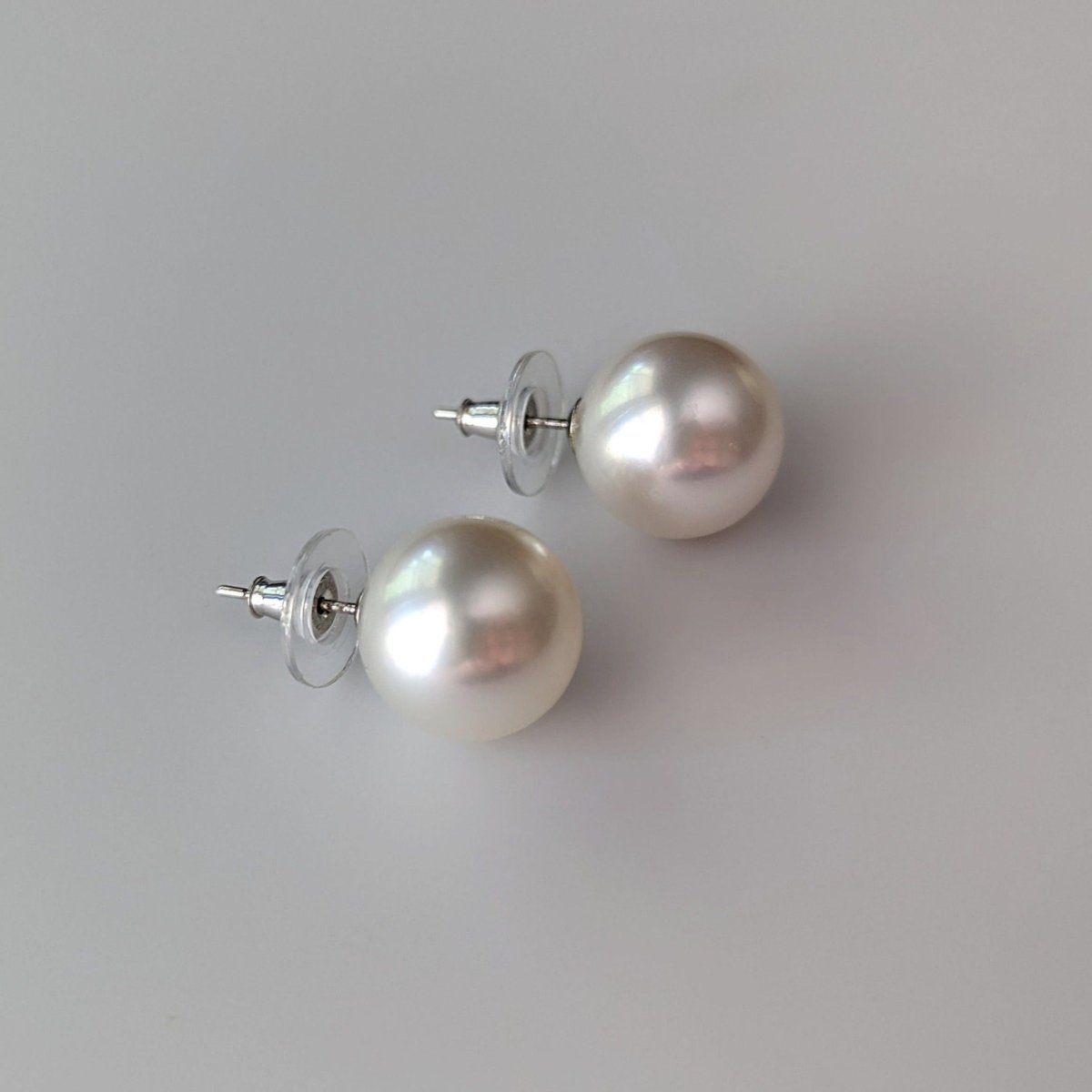 12-13mm Amazing White South Sea Pear Stud Earrings
