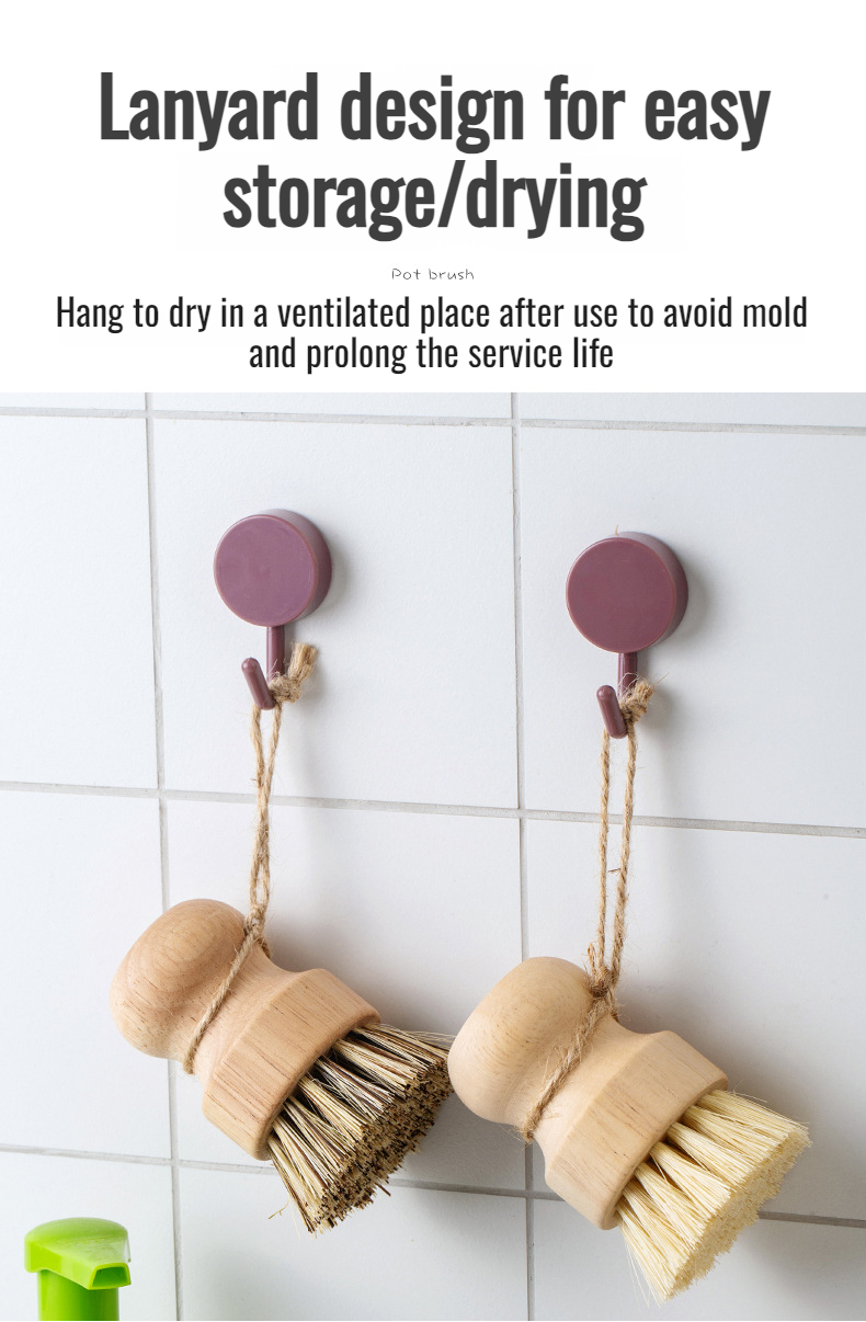 Solid wood dish cleaning brush on countertop