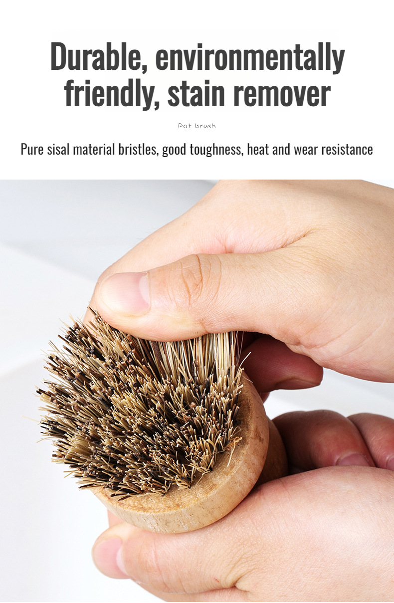Ergonomic wooden dish brush in hand