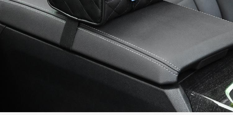 Close-up of car tissue box with cute cartoon design