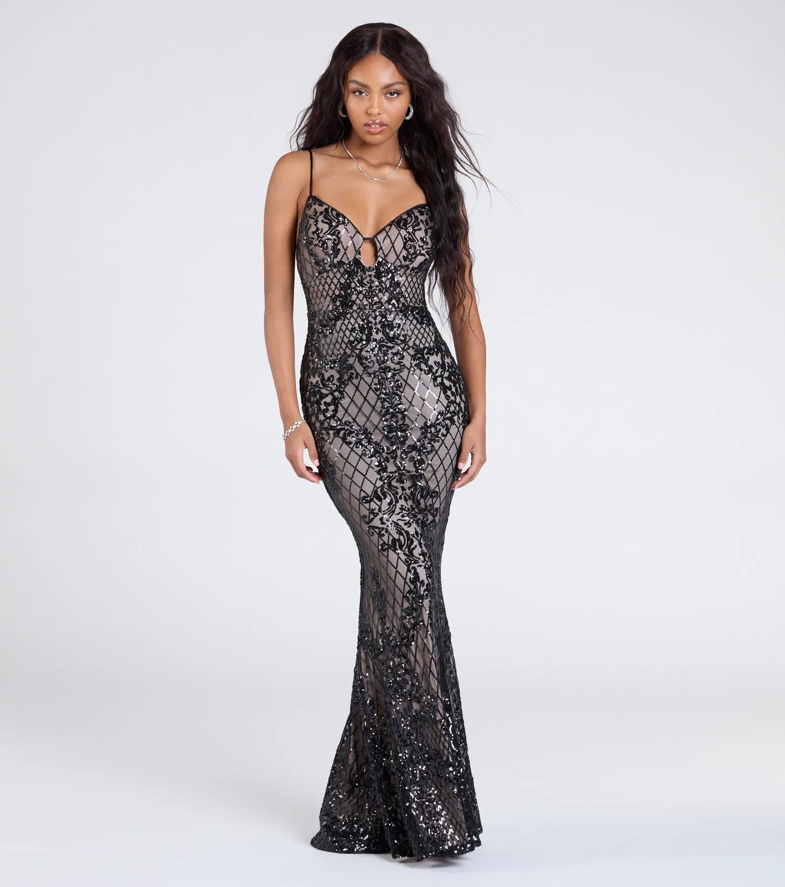 Celebrate in style with the Dakota Mermaid Sequin Formal Dress, a black formal wedding guest dress featuring an elegant silhouette and luxe details, perfect for a black-tie celebration.