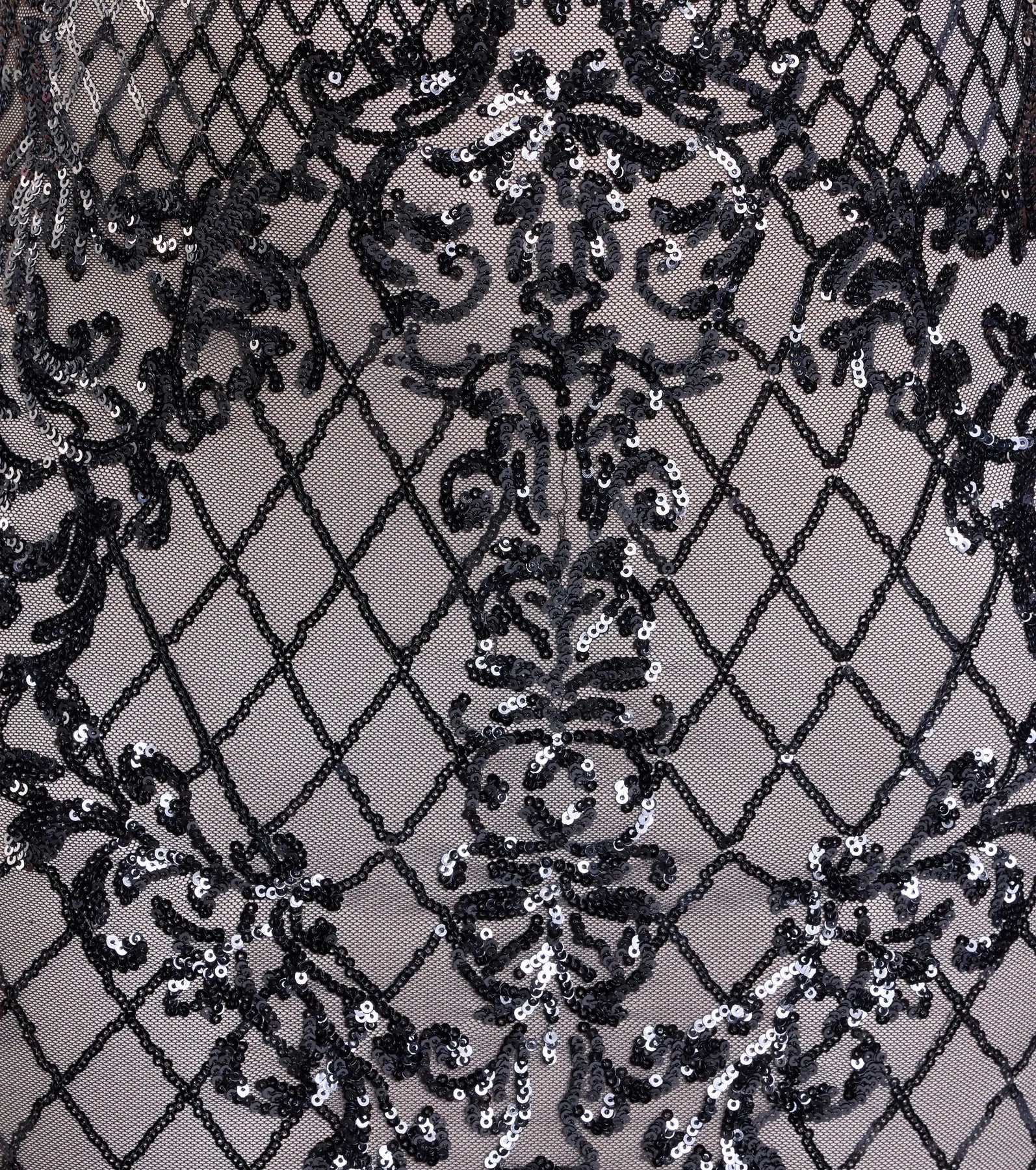 Make a bold statement in the Dakota Mermaid Sequin Formal Dress in black, the perfect spring dress for weddings, cocktail hours, nights out, and/or seasonal celebrations.