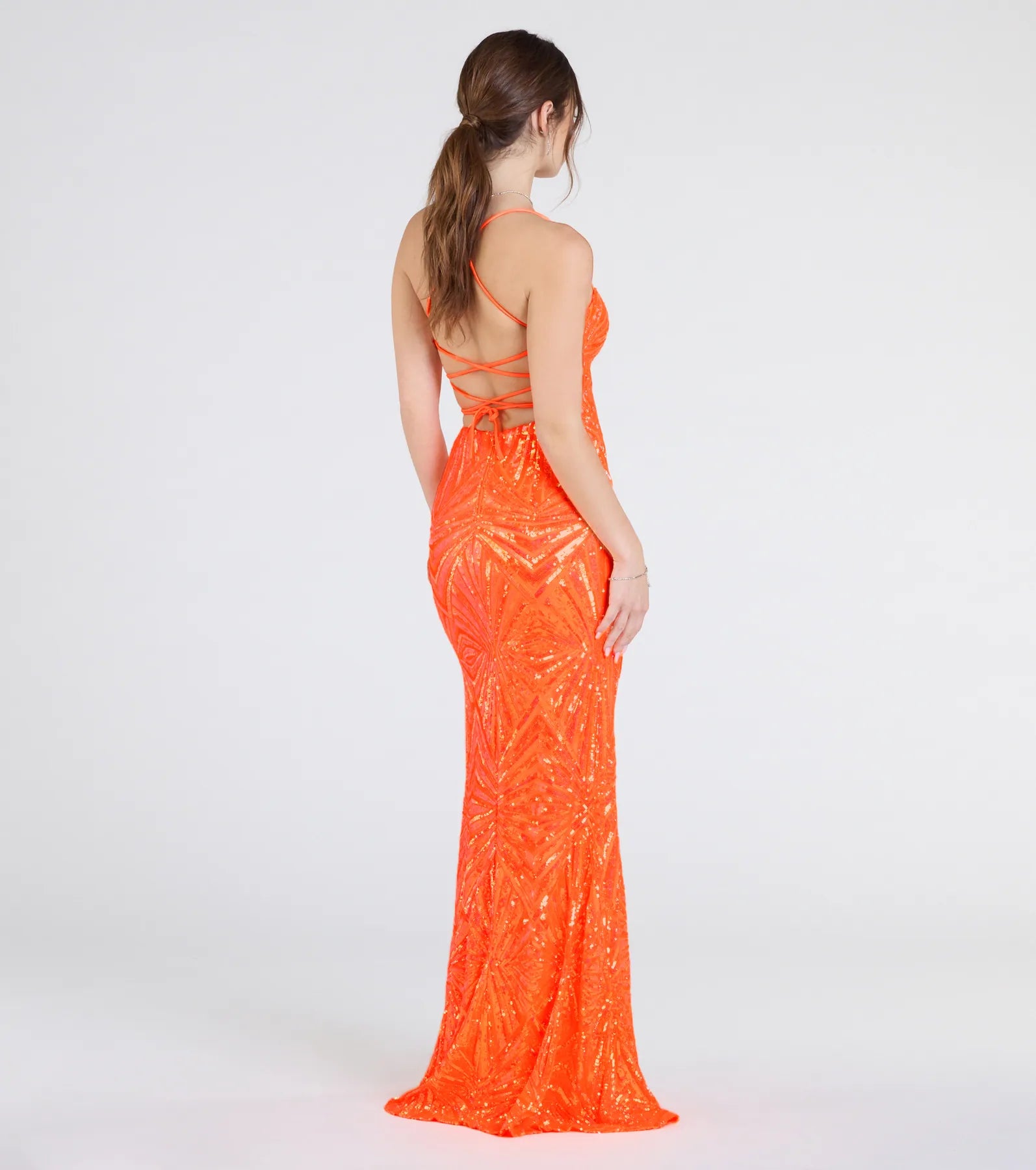Make the big day unforgettable with the Lottie Sequin Lace-Up Mermaid Dress, a gorgeous orange bridesmaid dress that balances elegance and affordability.