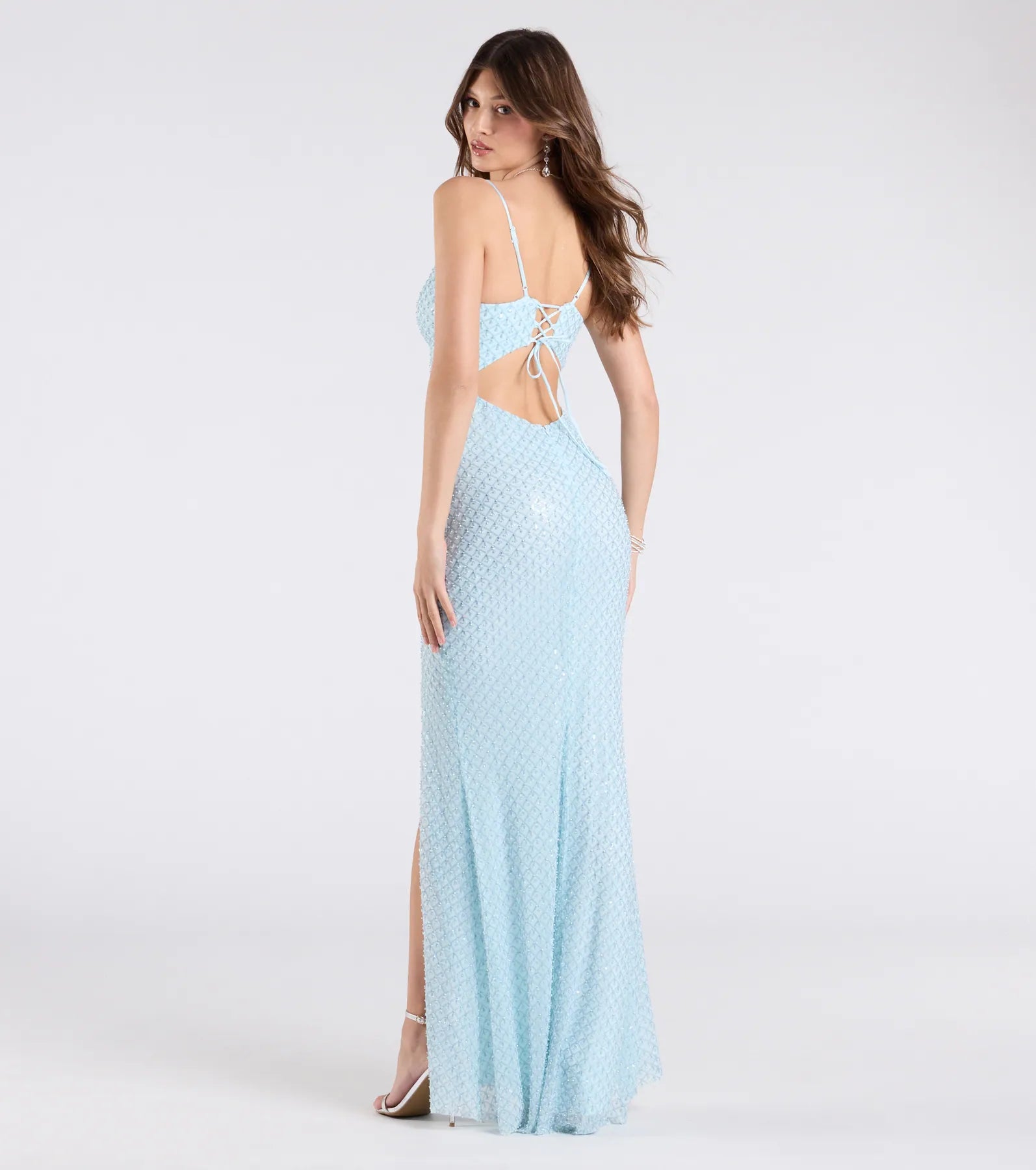 Turn heads at Prom 2025 in this light blue prom dress, where statement-making details meet the iconic style of the Valeria Cutout Lace-Up Sequin Beaded Formal Dress.