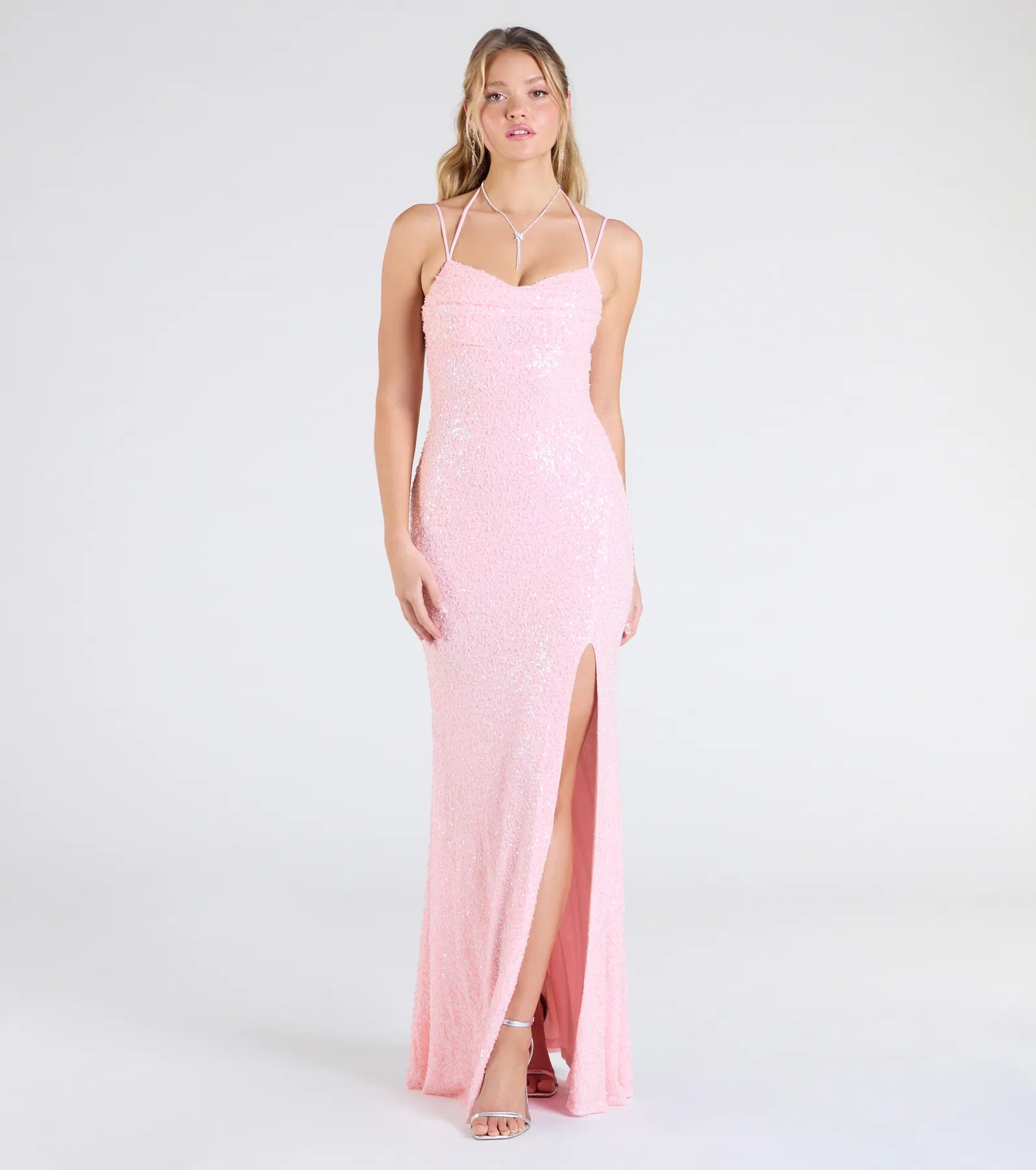 Make a bold statement in the Kaitlyn Cowl Neck Slit Beaded Sequin Formal Dress in pink, the perfect spring dress for weddings, cocktail hours, nights out, and/or seasonal celebrations.
