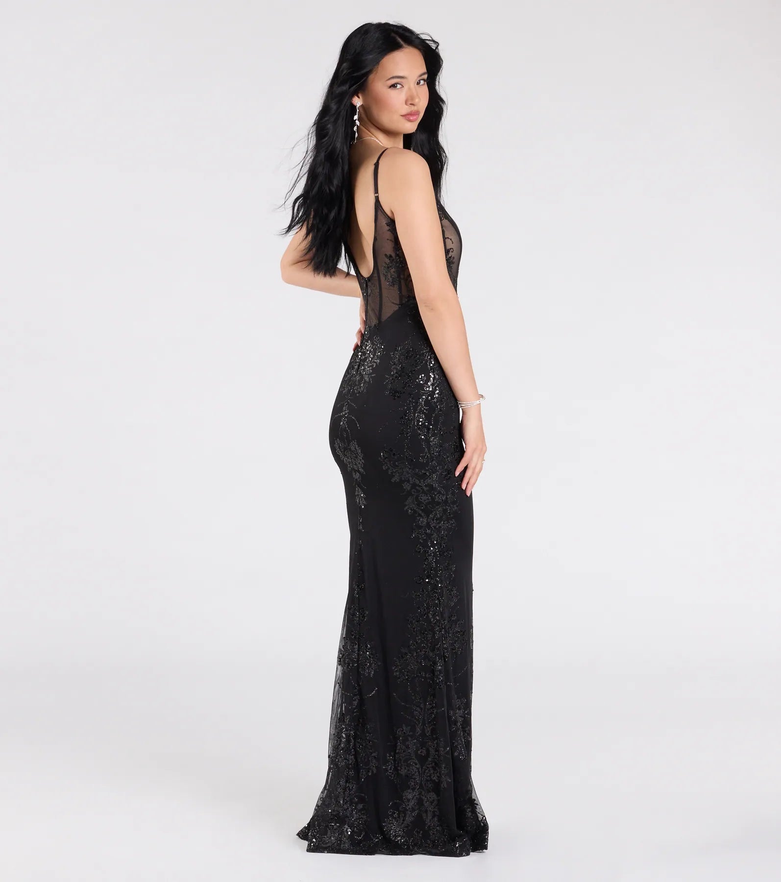 The Lindsay Corset Mermaid Sequin Glitter Formal Dress is a show-stopping black prom dress, offering a sleek, slimming silhouette that enhances your natural beauty for an unforgettable night.