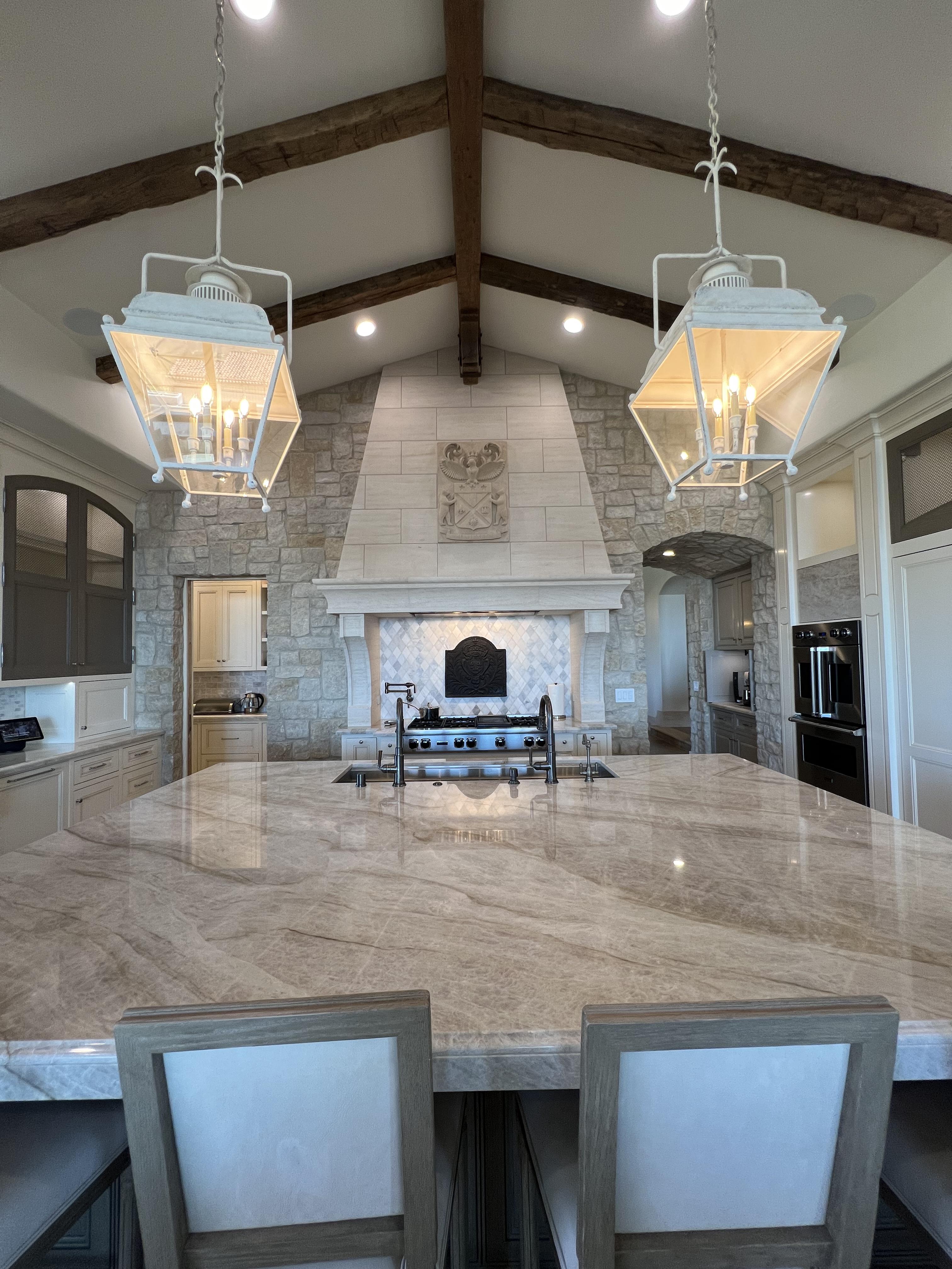 Kitchen plans or cabinet samples on a table