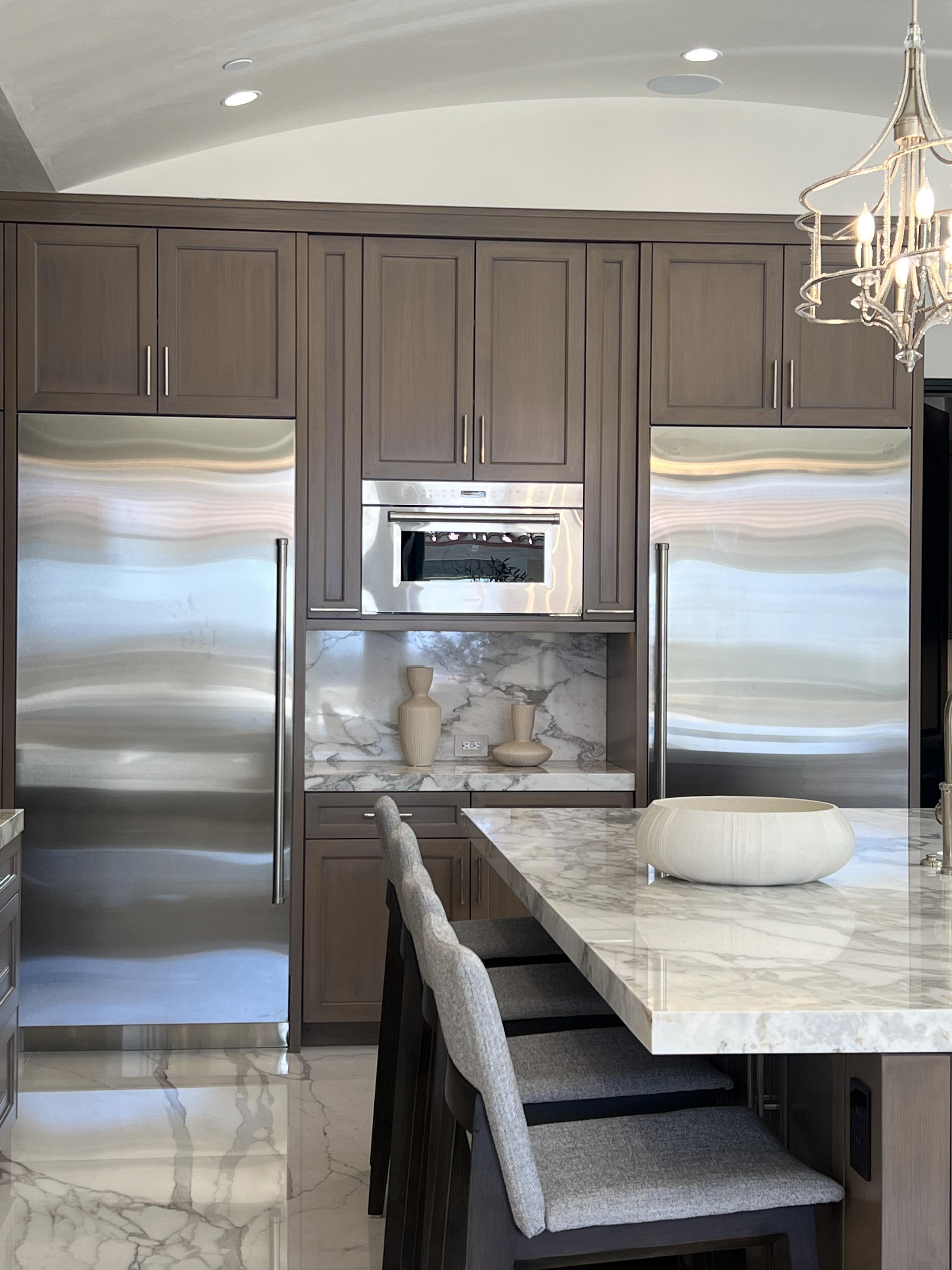Cabinets loaded for pickup or installed in a finished kitchen