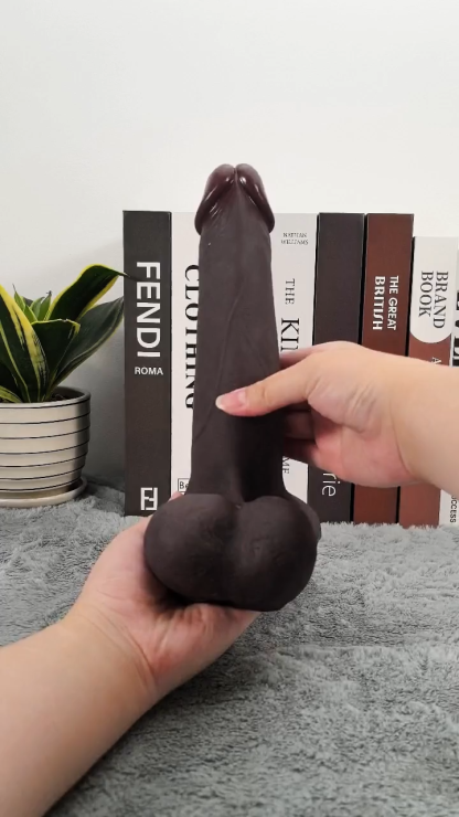 Logan L 9.4" - D 2" Vac-U-Lock Black Sliding Skin Dildo With Moving Balls