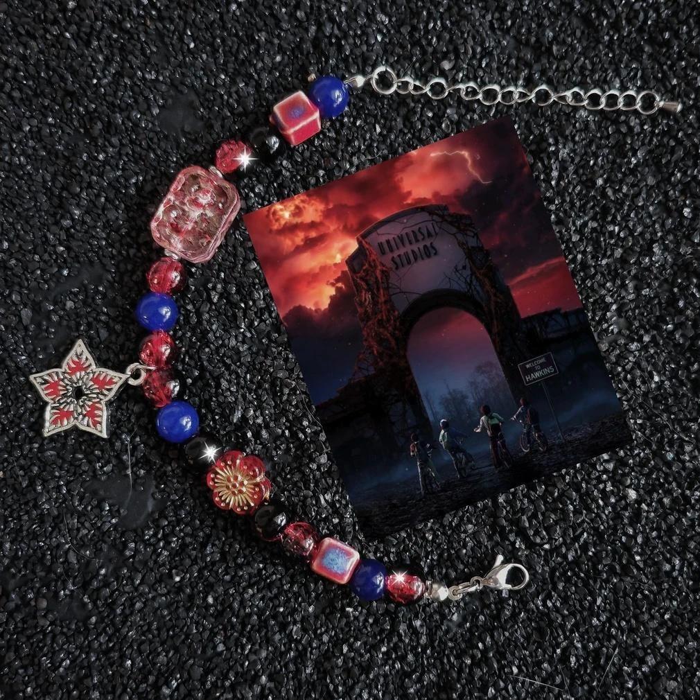 Stranger Things Inspired Crystal Bead Bracelet with Alloy Flower Charm, Upside Down Star Pendant, Lucky Crystal Energy Jewelry for Fans, Handmade Hawkins Themed Accessory, Gift for Women Men, Supernatural Collectible Fan Bracelet