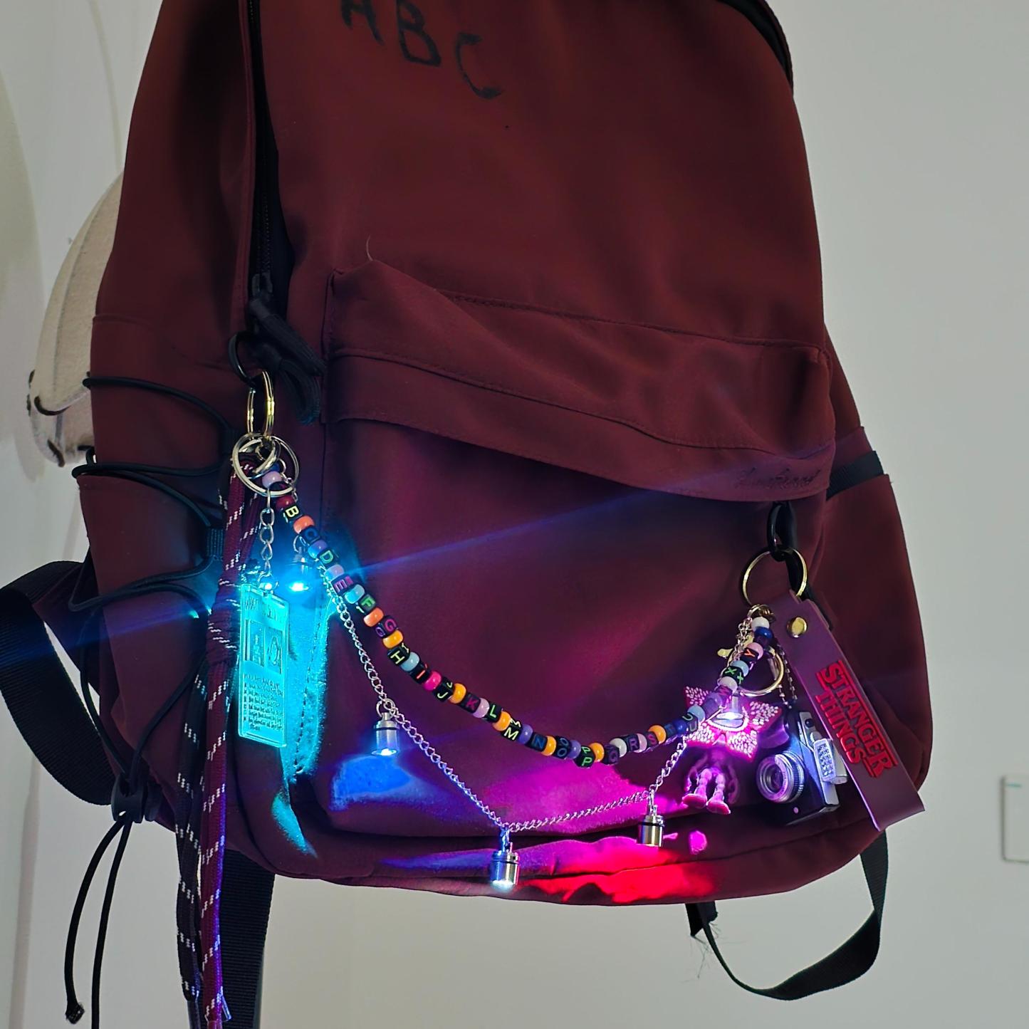 Stranger Things Light-Up Keychain Set with 5 LED Beads | Demogorgon Bag Charm with Replaceable Batteries | Hawkins Inspired Accessories for Backpacks & Keys | Glowing Fan Merch Gift for Netflix Series Lovers