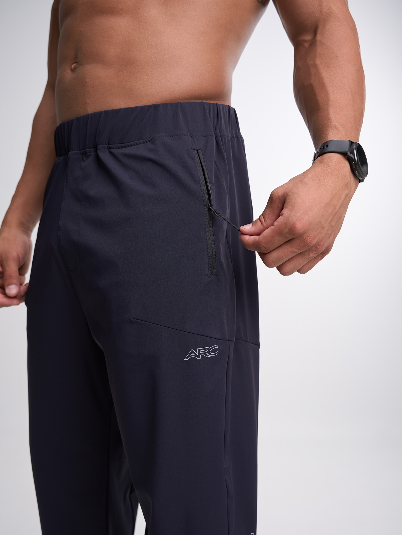 Men's Elastic Waist Zipper Pocket Casual Tapered Sports Pants