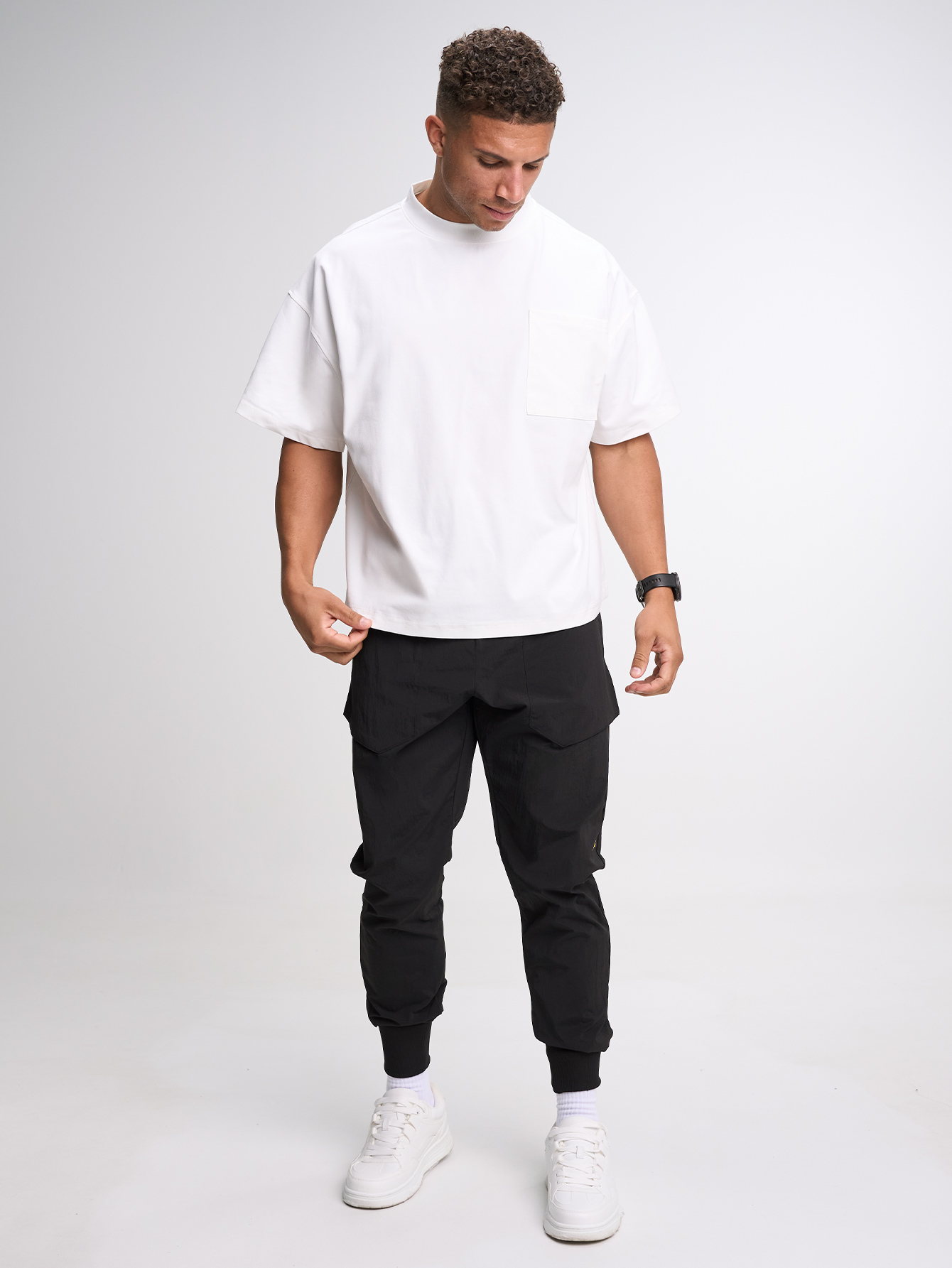 Men's Elastic Waist Zipper Pocket Casual Tapered Sports Pants