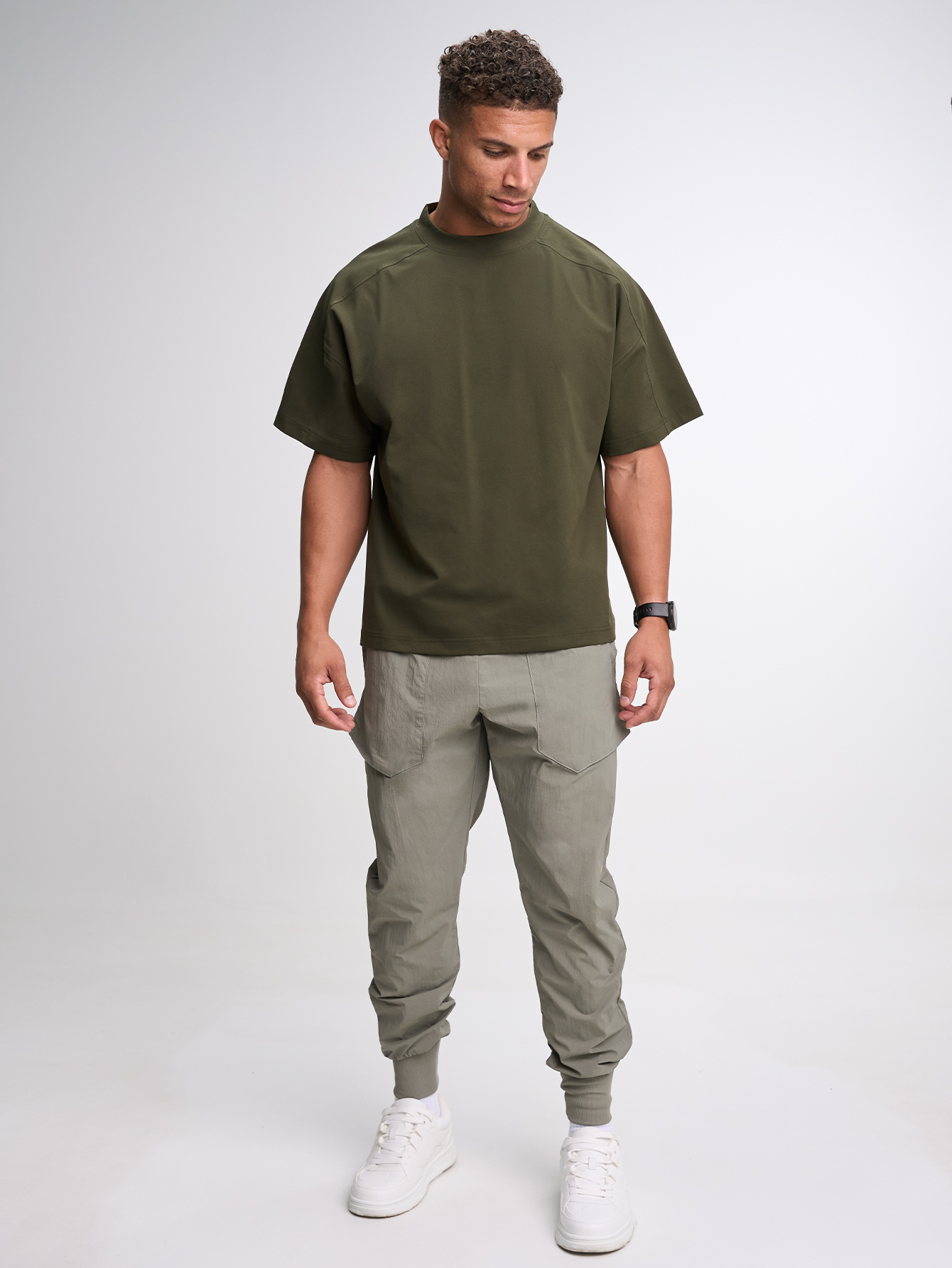 Men's Elastic Waist Zipper Pocket Casual Tapered Sports Pants