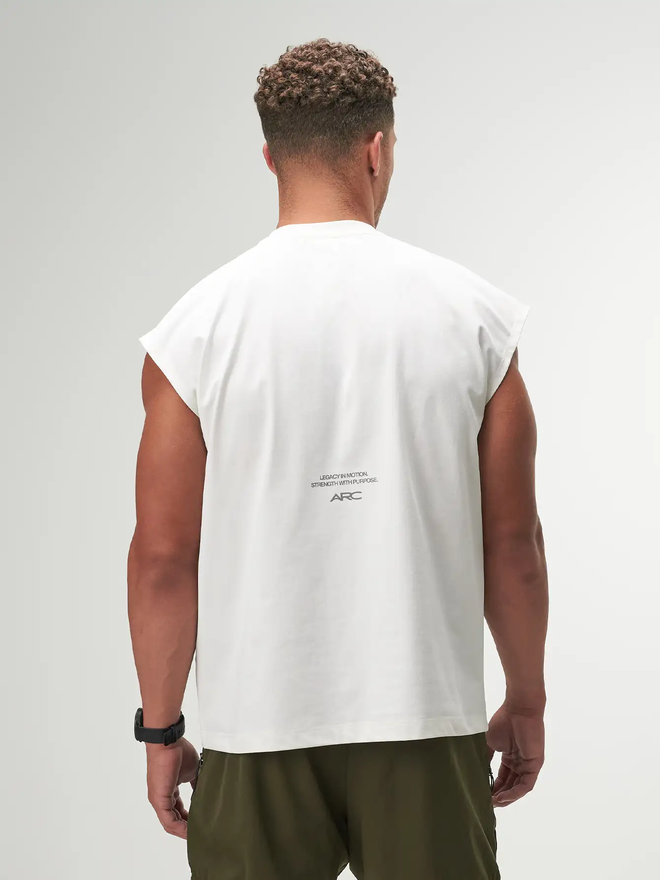 Motion Cap Sleeve Tank for women, lightweight activewear top for gym workouts, breathable fabric, stylish design.