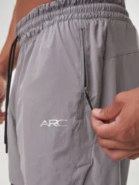 Grey Flow Form 5" 2-in-1 shorts for men, featuring lightweight fabric and moisture-wicking technology for active wear.