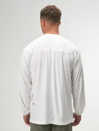 Oversized white long sleeve performance shirt for gym workouts by ARC Activewear, perfect for active lifestyles.