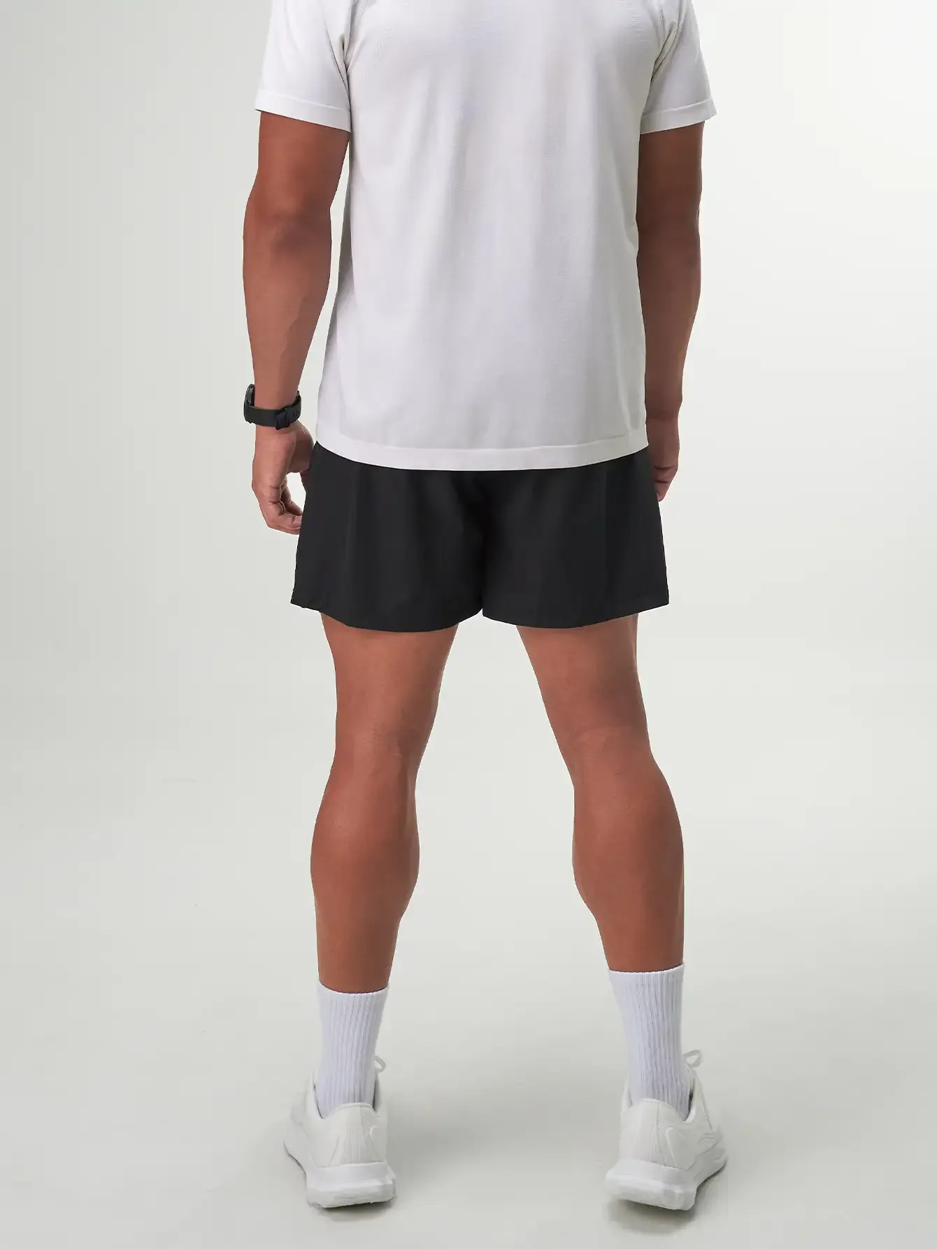 Flow Form 5" 2-in-1 Short in Black for men, perfect for running, basketball, and gym workouts with quick-dry fabric.
