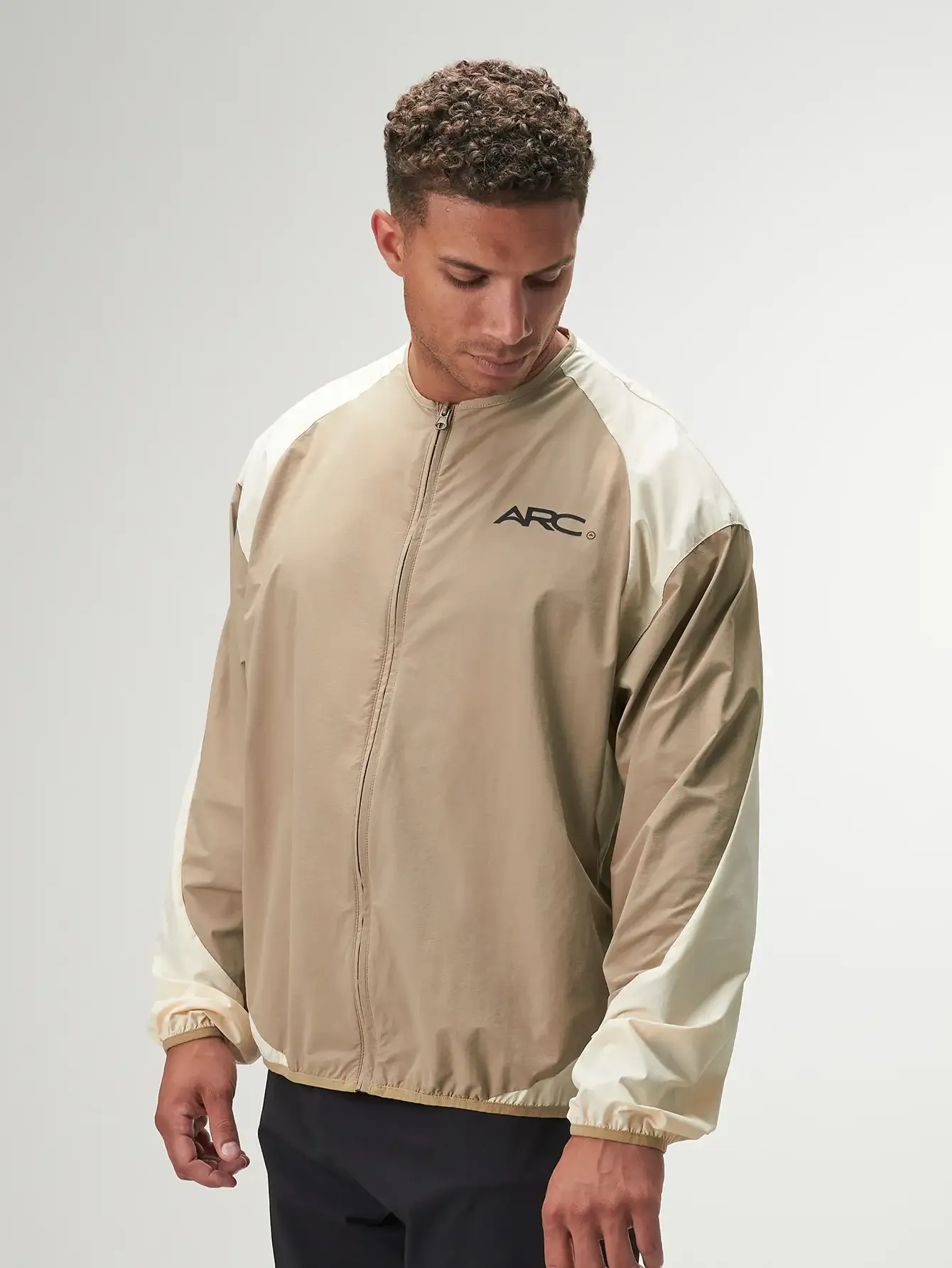 Statement Full Zip Jacket in sleek black, featuring a modern design, zip closure, and comfortable fit for active lifestyles.