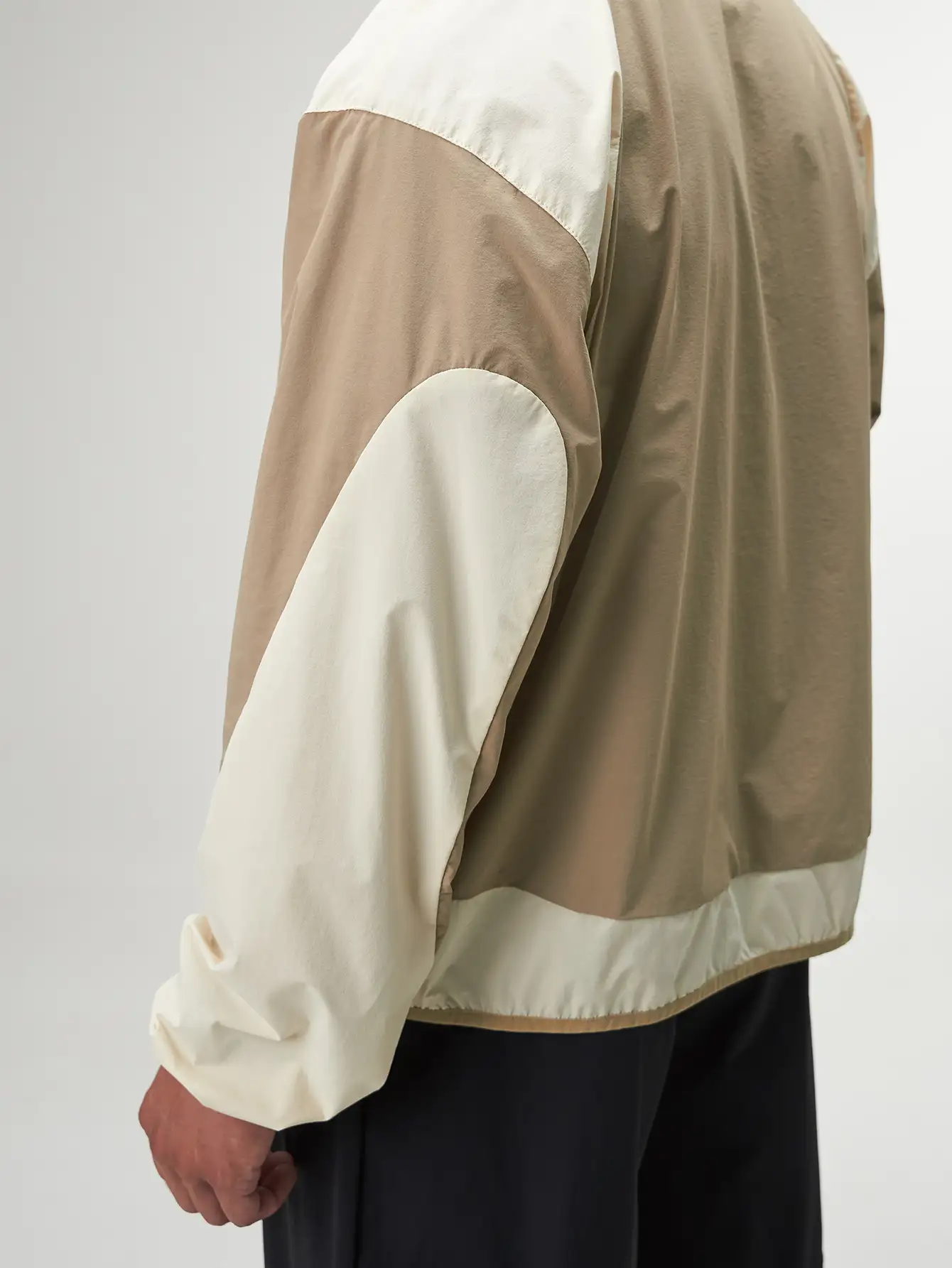 Stylish Statement Full Zip Jacket in versatile black, perfect for layering and outdoor activities.