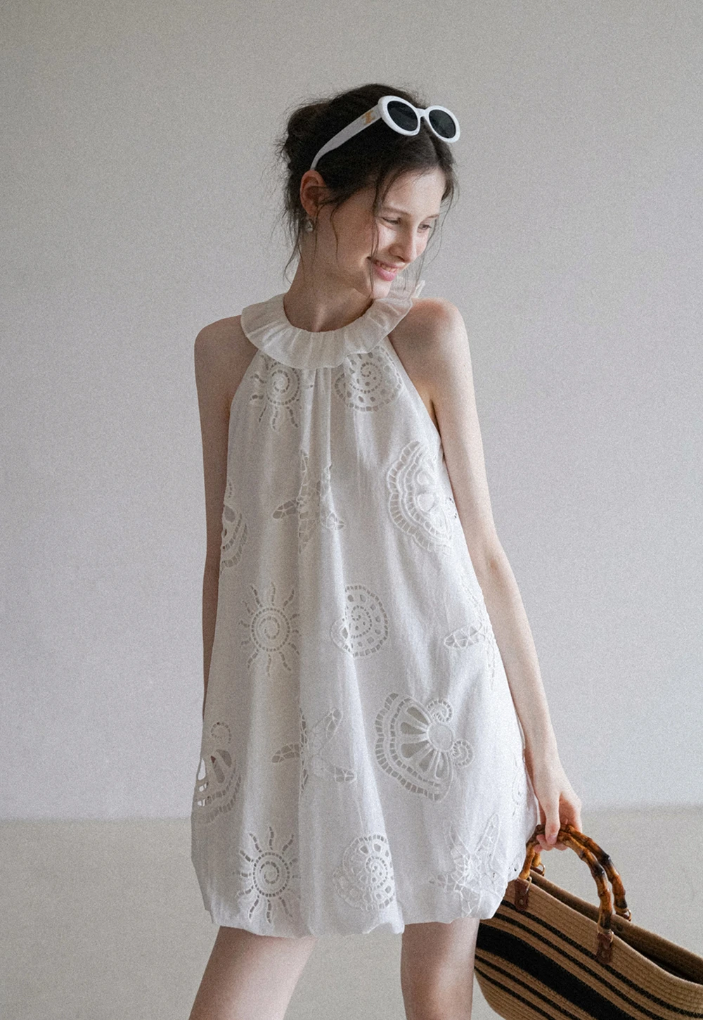 Women’s Sleeveless Eyelet Mini Dress with Ruffle Neck