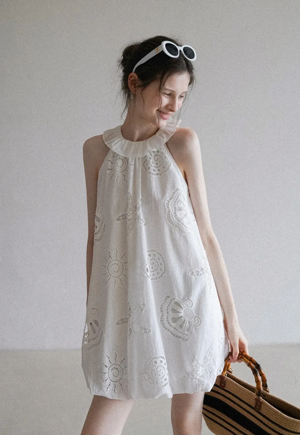 Women’s Sleeveless Eyelet Mini Dress with Ruffle Neck