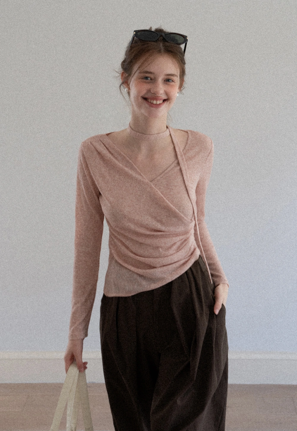 Asymmetrical rap-front draped knit top