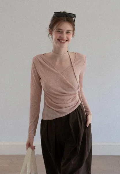 Asymmetrical rap-front draped knit top