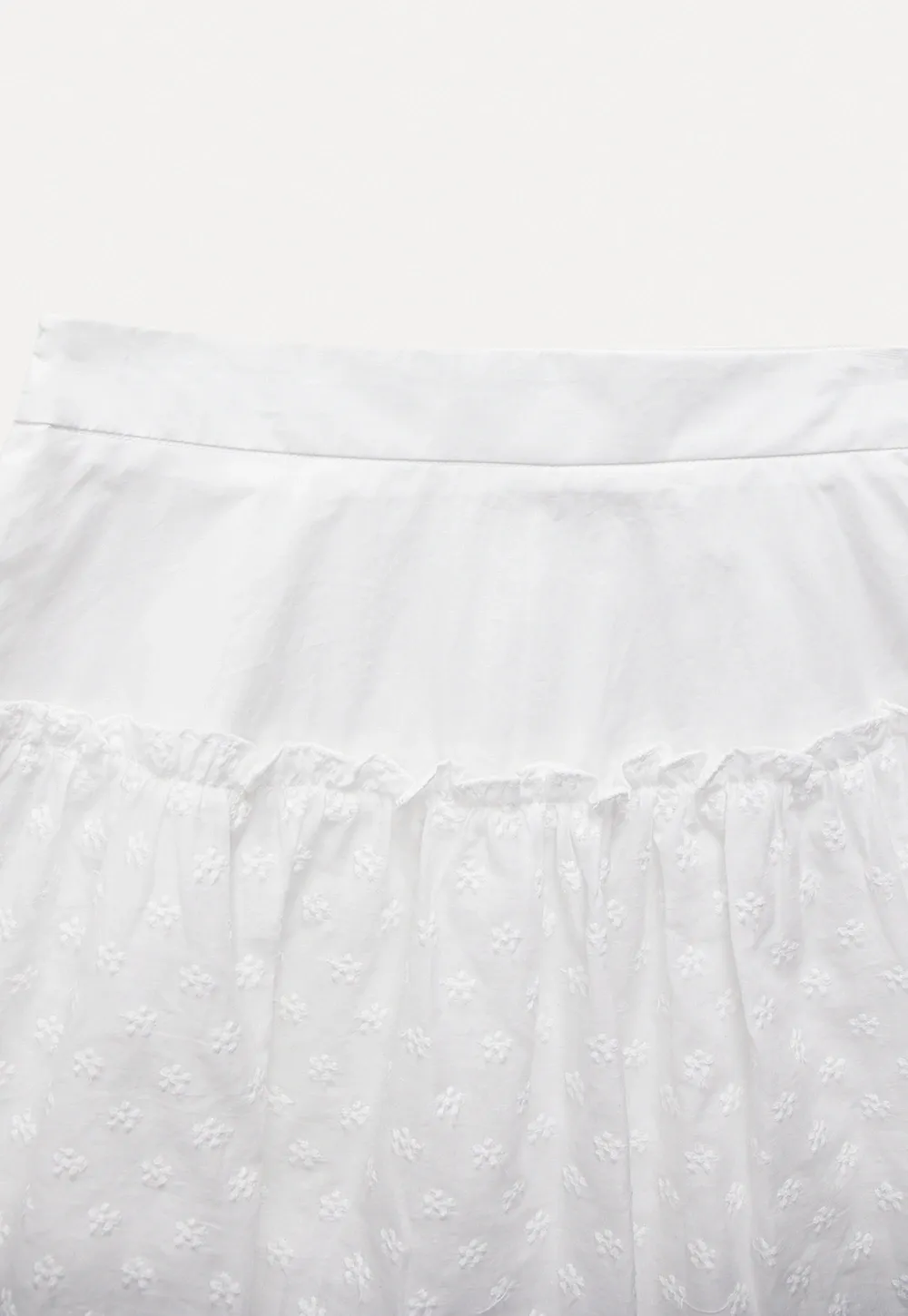 White Pleated Skirt with Floral Details