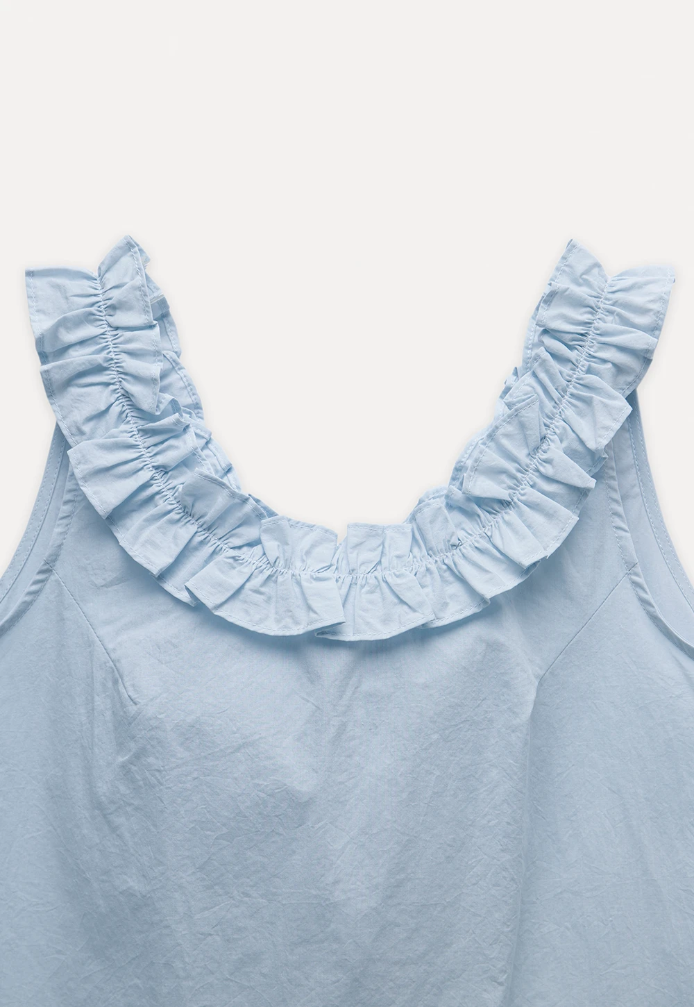 Women’s Sleeveless Top with Ruffle Neckline