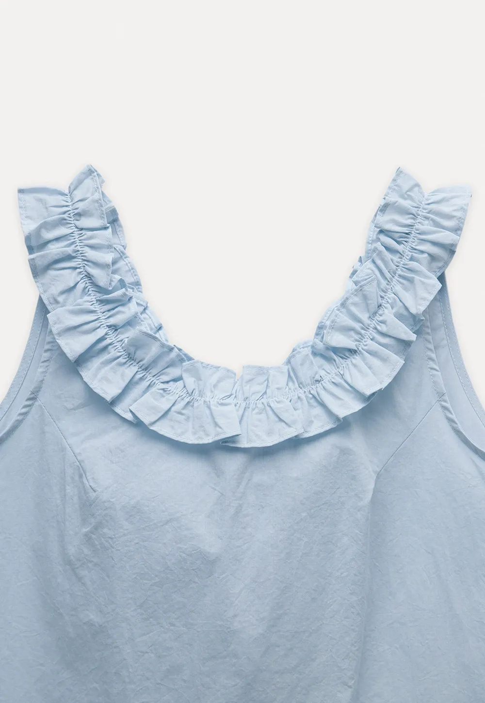 Women’s Sleeveless Top with Ruffle Neckline
