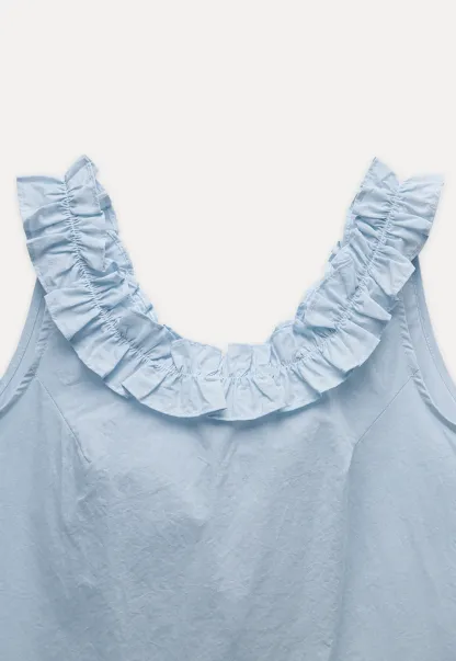 Women’s Sleeveless Top with Ruffle Neckline