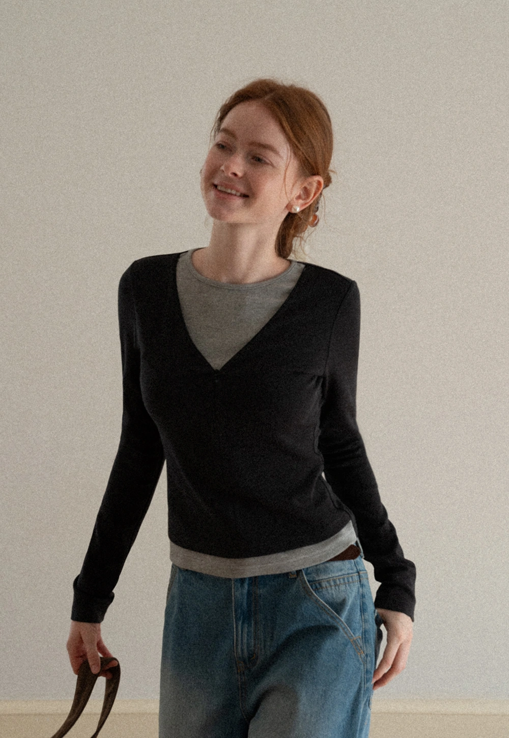 Long sleeve crop top with round neck and hem stitching design