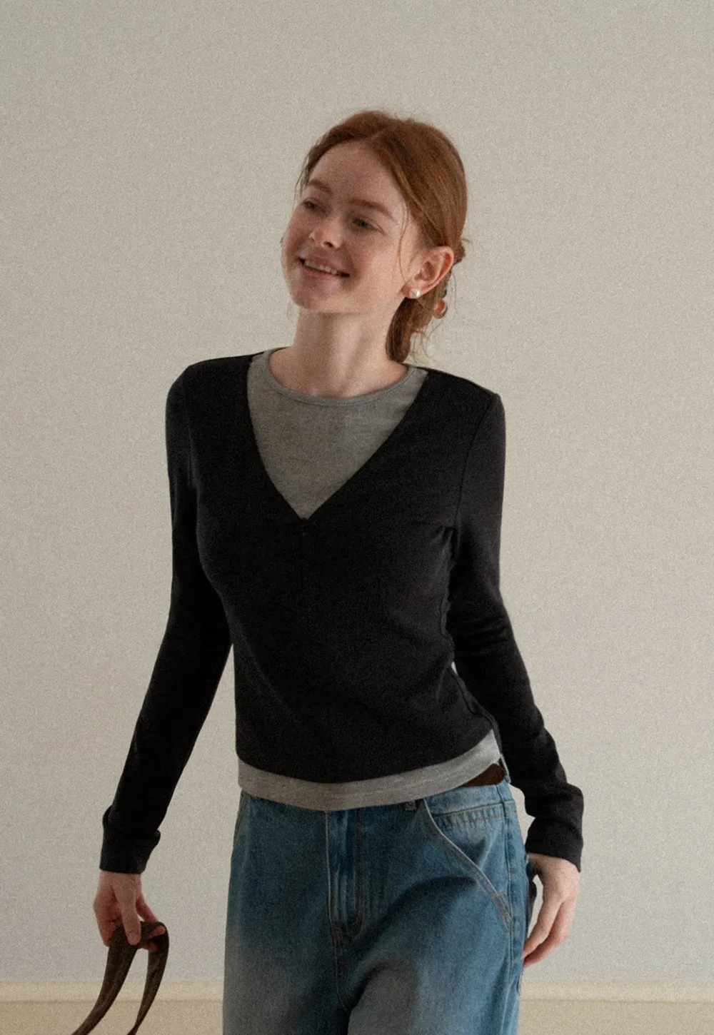 Long sleeve crop top with round neck and hem stitching design