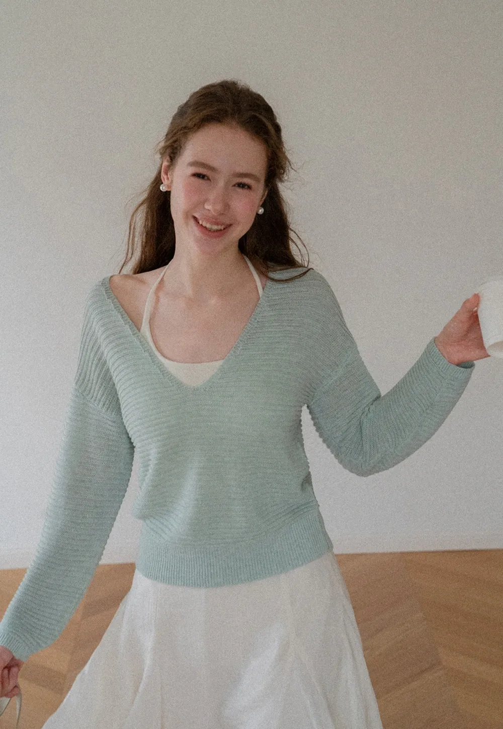 Ladies V‑Neck Knitted Pullover and White Cami Set
